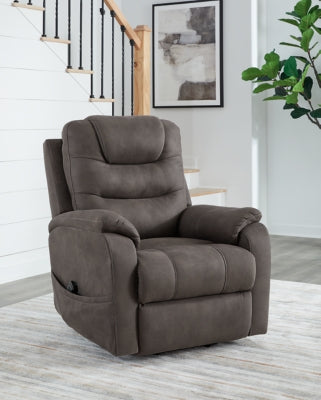 Ashley Furniture Snowfield Power Lift Recliner in beige fabric, showing the closed reclined position with padded armrests