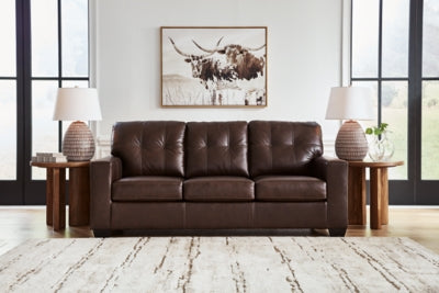 Ashley Furniture Santorine sofa with plush beige upholstery and modern design, showcasing its comfortable seating and elegant style.