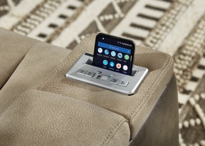 Ashley Furniture Next-Gen DuraPella power recliner with built-in wireless charging pad and plush cushioned seating.