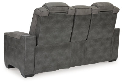 Ashley Furniture Next-Gen DuraPella power reclining loveseat with console, featuring plush cushions and built-in cup holders.