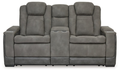 Ashley Furniture Next-Gen DuraPella power reclining loveseat with built-in console, shown in a head-on view.