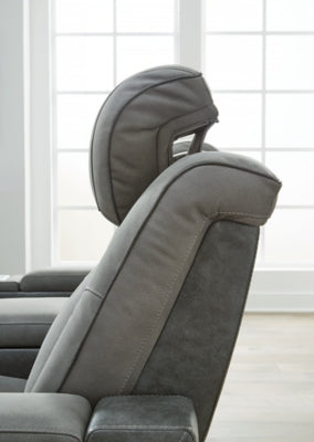 Ashley Furniture Next-Gen DuraPella power recliner with plush cushioning and adjustable headrest, shown in a modern living room setting.
