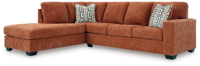 Ashley Furniture Aviemore sectional with chaise, featuring plush fabric, multiple cushions, and a modern design for living room comfort.