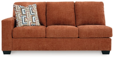Ashley Furniture Aviemore sectional with chaise, showing plush fabric cushions and modern design from a front head-on view.
