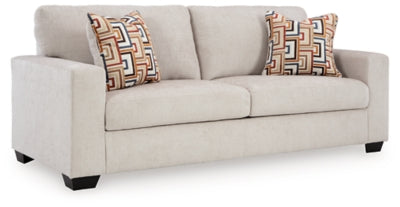 Ashley Furniture Aviemore Sofa with plush cushions and modern design, shown from an angled view.
