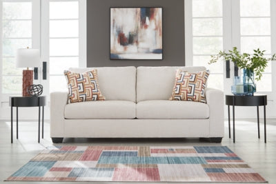 Ashley Furniture Aviemore Sofa with plush fabric and modern design, featuring cushioned armrests and a spacious seating area.