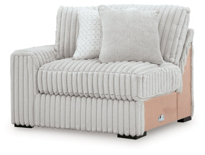 Ashley Furniture Stupendous sectional sofa with plush cushions and modern design, shown from an angled view.