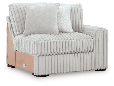 Ashley Furniture Stupendous sectional sofa with plush cushions and modern design, shown from an angled perspective.