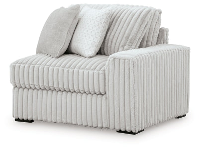 Ashley Furniture Stupendous sectional sofa with plush cushions and modern design, shown from an angled view.