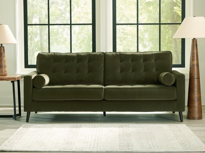 Ashley Furniture Reveon Lakes Sofa with plush cushions and contemporary design, shown in a cozy living room setting.