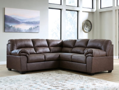 Ashley Furniture WillowBend sectional sofa with plush cushions and neutral fabric, shown in a modern living room setting.