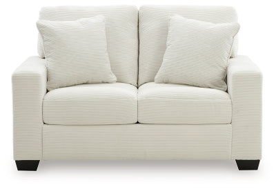 Greenbriar Ashley Furniture loveseat with plush fabric and cushioned armrests, shown from a head-on view.
