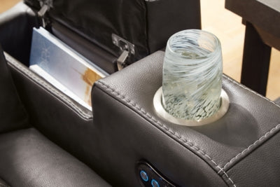 Close-up of Ashley Furniture Fyne-Dyme Power Reclining Loveseat with console, showing armrest and detailed upholstery.