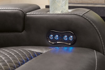 Ashley Furniture Fyne-Dyme Power Reclining Loveseat with Console, showing plush fabric, built-in control panel, and comfortable seating.