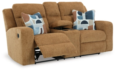 Ashley Furniture Kanlow reclining loveseat with built-in console, shown from an angle with open reclining seats and plush upholstery.