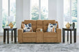 Ashley Furniture Kanlow reclining loveseat with built-in console, gray fabric upholstery, and plush cushioning for comfort.