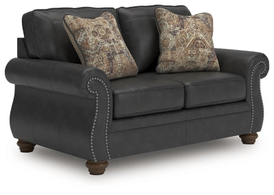 Ashley Furniture Chasemore loveseat shown from an angled view, featuring plush upholstery and cozy seating.