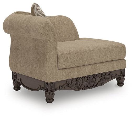 Ashley Furniture Chelsworth right-arm facing corner chaise chair shown from an angled side view in a modern living room setting.