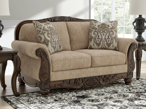 Ashley Furniture Chelsworth loveseat with plush fabric and cushioned armrests, perfect for cozy living room seating.