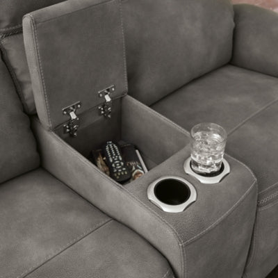Ashley Furniture Next-Gen DuraPella power reclining loveseat with console, showing plush fabric and built-in cup holders.
