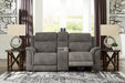 Ashley Furniture Next-Gen DuraPella power reclining loveseat with console, featuring plush upholstery and built-in cup holders.