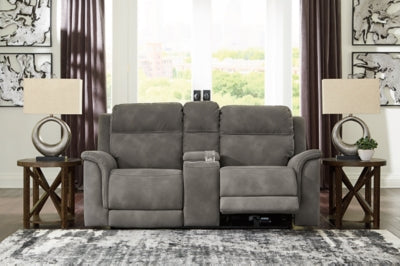 Ashley Furniture Next-Gen DuraPella power reclining loveseat with console, featuring plush upholstery and built-in cup holders.