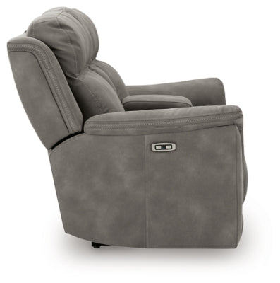 Ashley Furniture Next-Gen DuraPella power reclining loveseat with console, featuring plush upholstery and built-in cup holders.
