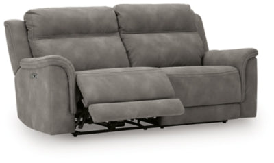 Ashley Furniture Next-Gen DuraPella Power Reclining Sofa with plush upholstery and adjustable reclining seats, shown from an angle.