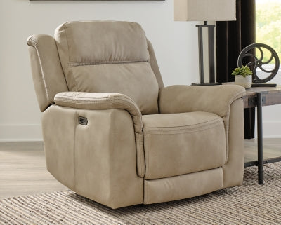 Ashley Furniture Next-Gen DuraPella power recliner with plush cushioning and dark brown leather upholstery, viewed from the closed position.