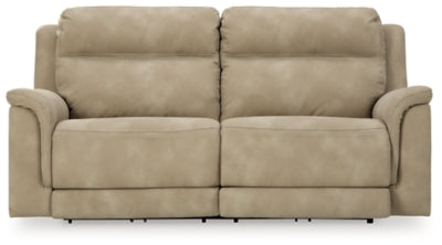 Ashley Furniture Next-Gen DuraPella power reclining sofa with plush cushions and sleek design, shown from a front head-on view.