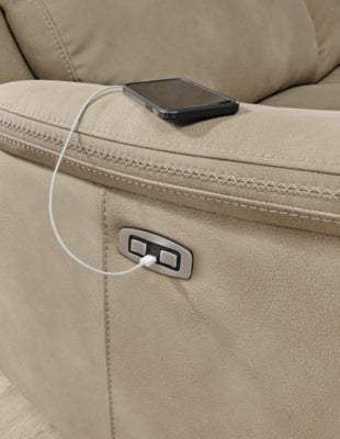 Close-up of Ashley Furniture's Next-Gen DuraPella Power Reclining Sofa showing reclining mechanism and plush fabric upholstery.