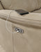Close-up of Ashley Furniture's Next-Gen DuraPella Power Reclining Sofa showing reclining mechanism and plush fabric upholstery.