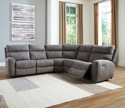 Ashley Furniture Next-Gen DuraPella power reclining sectional with plush cushions and modern design, shown in a spacious living room setting.
