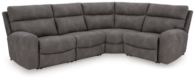 Ashley Furniture Next-Gen DuraPella power reclining sectional with plush cushions and modern design, shown in a spacious living room setting.