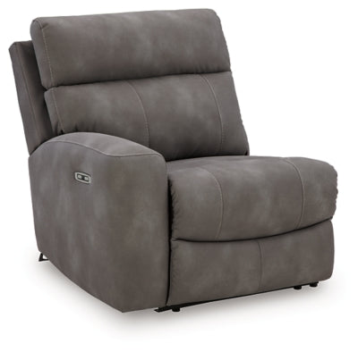 Ashley Furniture Next-Gen DuraPella power reclining sectional shown from an angled view with closed recliners and plush upholstery.
