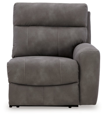 Ashley Furniture Next-Gen DuraPella power reclining sectional with plush cushions and modern design, shown from front head-on.