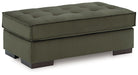 Ashley Furniture Caspian-Town oversized accent ottoman with plush fabric and a modern design, shown from an angled side view.