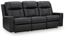 Ashley Furniture Mackmenville reclining sofa shown from an angle, featuring plush cushions and a modern, comfortable design.