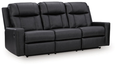 Ashley Furniture Mackmenville reclining sofa shown from an angle, featuring plush cushions and a modern, comfortable design.
