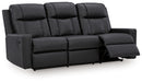 Ashley Furniture Mackmenville reclining sofa shown from an open angle, featuring plush cushions and a modern design.