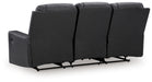 Ashley Furniture Mackmenville reclining sofa with plush cushions and a neutral fabric finish, shown from the back view.