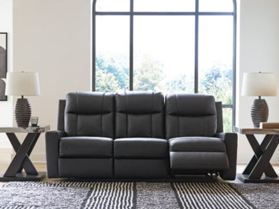 Ashley Furniture Mackmenville reclining sofa, open view showing plush fabric upholstery and adjustable reclining features.