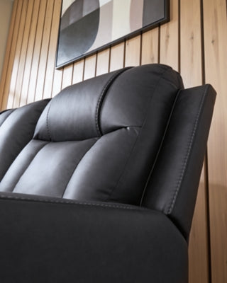 Ashley Furniture Mackmenville reclining loveseat with console, featuring plush upholstery and built-in cup holders.