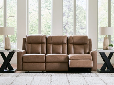 Open view of Ashley Furniture Mackmenville reclining sofa showcasing plush cushions and reclining features.