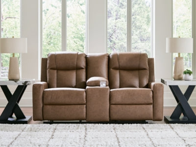 Ashley Furniture Mackmenville reclining loveseat with console, showing plush fabric, padded armrests, and built-in center console.