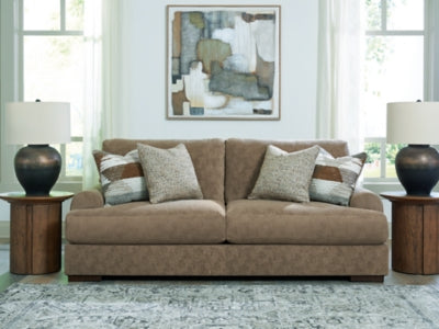 Ashley Furniture Jayne Park sofa with plush fabric upholstery and modern design, shown in a stylish living room setting.