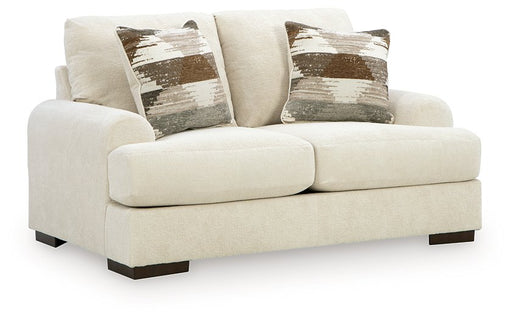 Ashley Furniture Jayne Park loveseat, upholstered in soft fabric, featuring a cozy, stylish design with plush cushions and wooden legs.