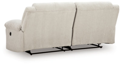 Ashley Furniture Orlen reclining sofa with plush cushions and a dark fabric finish, shown from the back view.