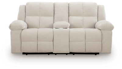 Ashley Furniture Orlen reclining loveseat with console, featuring plush fabric, padded armrests, and built-in cup holders.