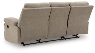 Ashley Furniture side-swipe reclining sofa with drop-down table, featuring plush cushions and modern design.